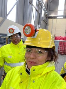Pilar Meza from Chile and Dr Comfort Asokoro-Ogaji in the United Kingdom during a visit to a mineral processing facility.