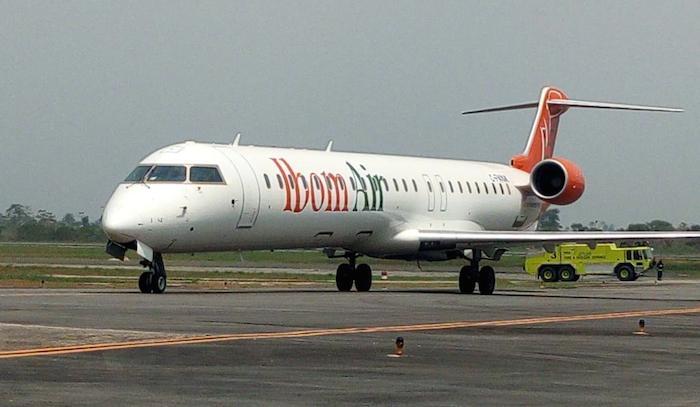Ibom Air plane preparing for takeoff at the airport.