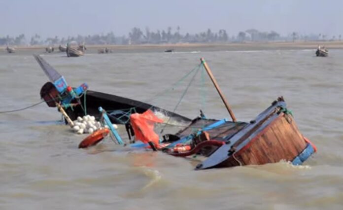 Sunken boat in floodwaters following Kogi boat accident in Ibaji community.